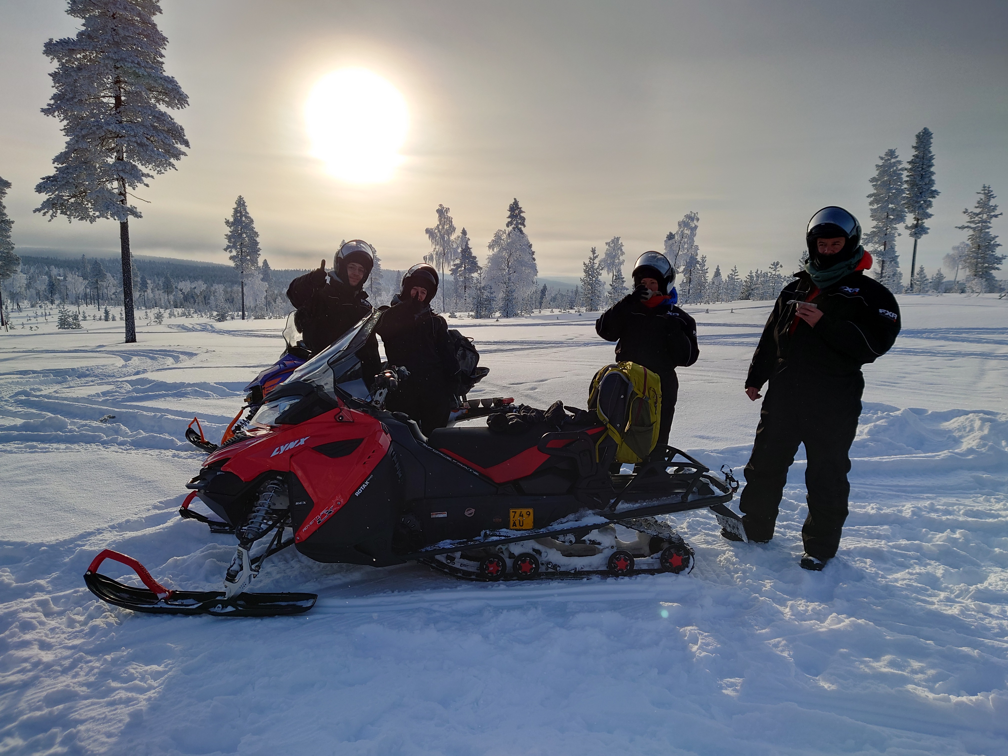 THE COUPLE SAFARI BY SNOWMOBILE