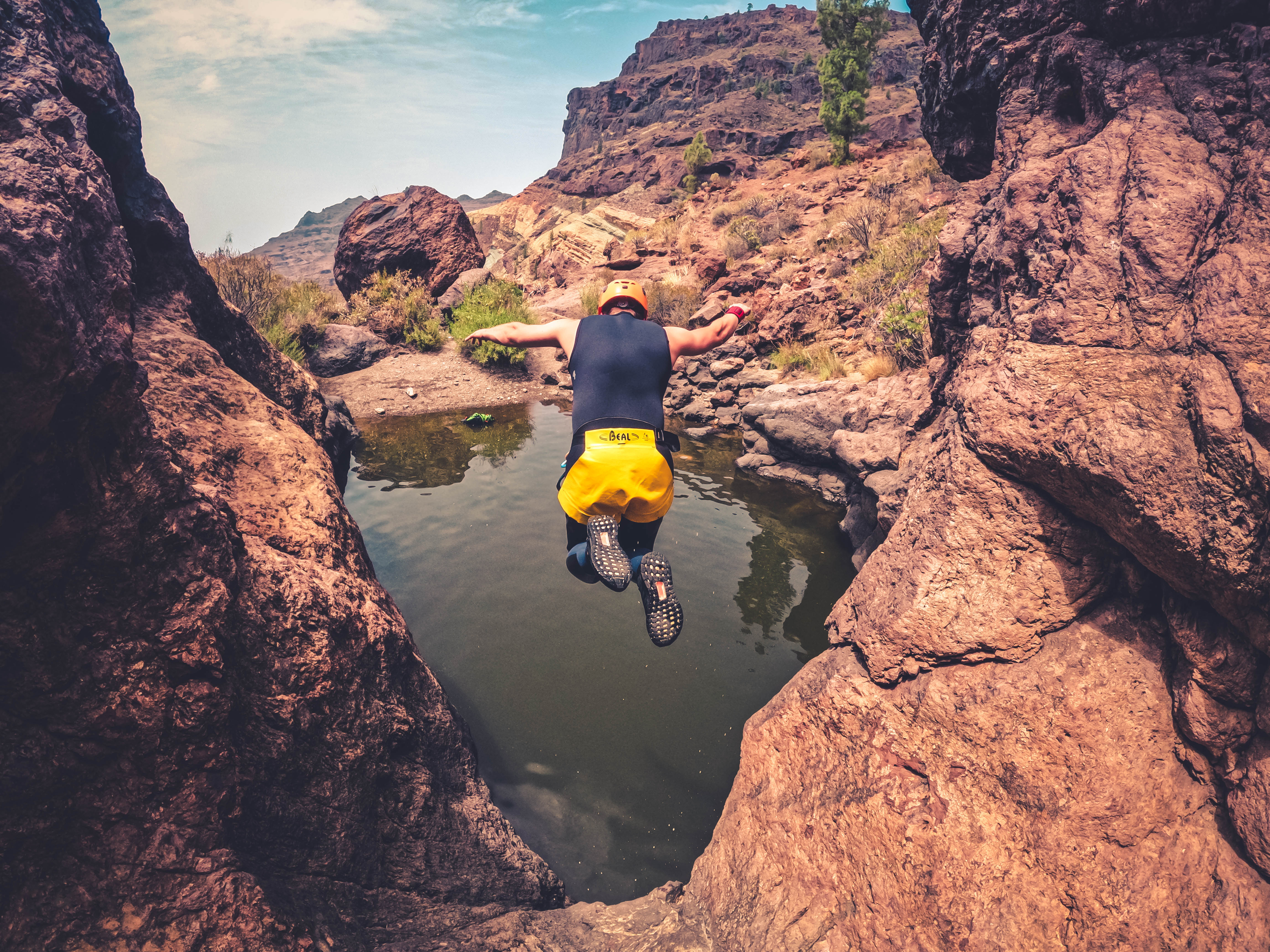 Cliff Jumping Canyoning in The Rainbow Rocks Ravine - Los Azulejos