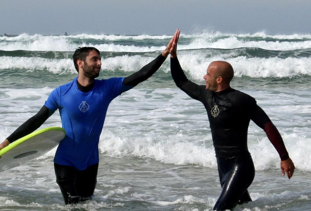 TEAM BUILDING - OPTION 4: Half Day Adventure: Surfing in Guincho + Electric Mountain Biking.