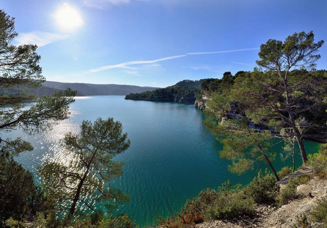 Discover Lake Esparron de Verdon on a 4-seater pedal boat with a slide