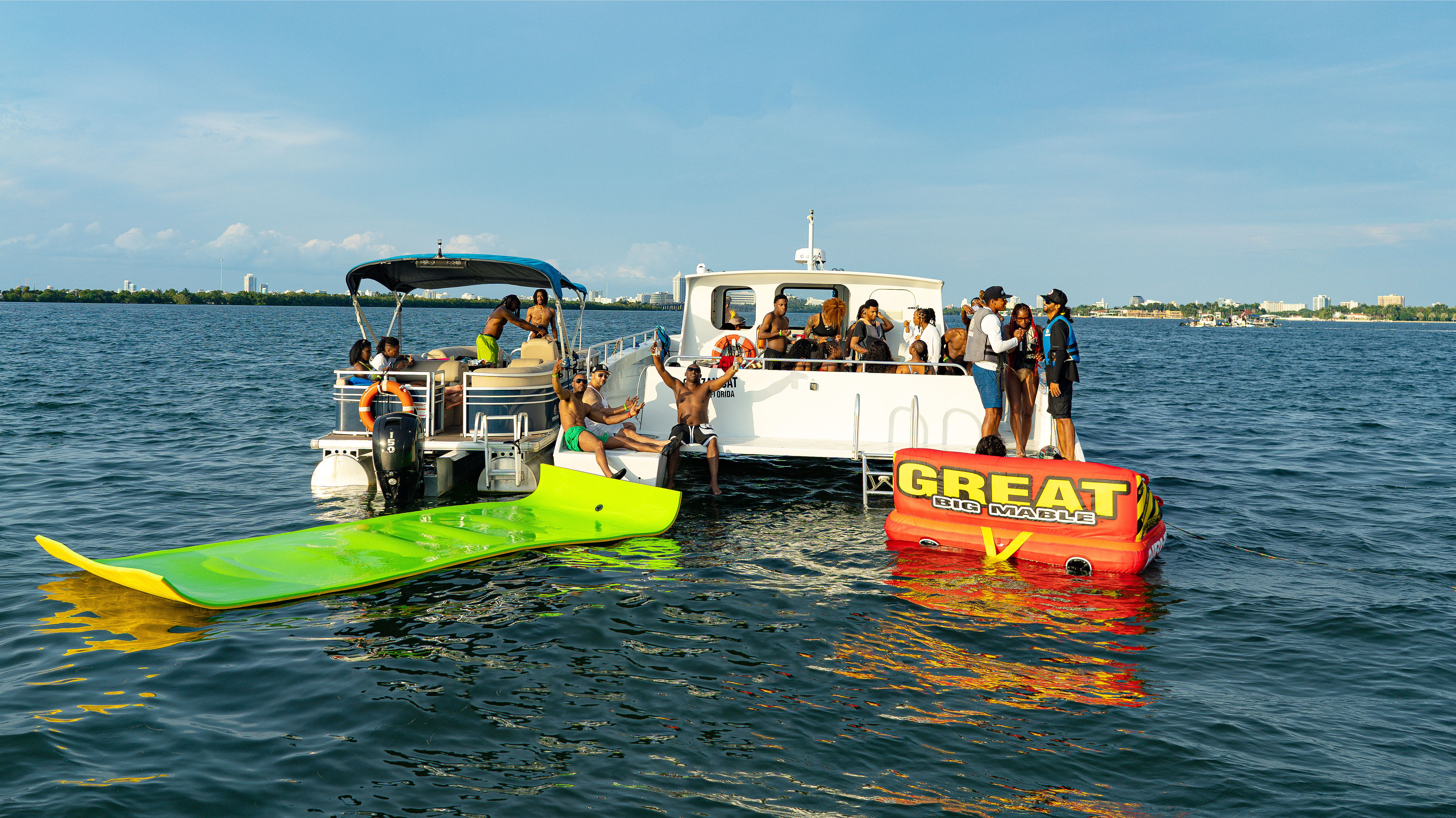 Ultimate Water Experience : Boat Tour with Jet Skis, Tubing & Open Bar