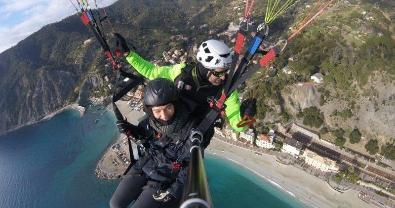 Paragliding: Fly over the Cinque Terre (Monterosso) during winter