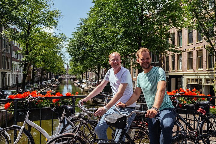 Amsterdam PRIVATE Bike Tour With Locals: Bike & Local Snack Included