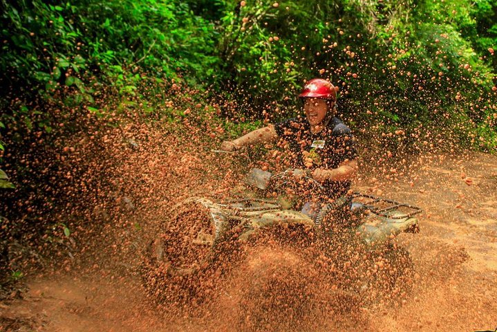 Adrenaline tour from Cancun driving a Atv experience Ziplines and a real Cenote