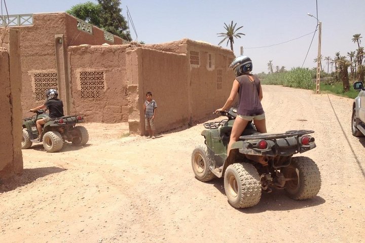 ATV Quad biking in Marrakech desert palmgrove