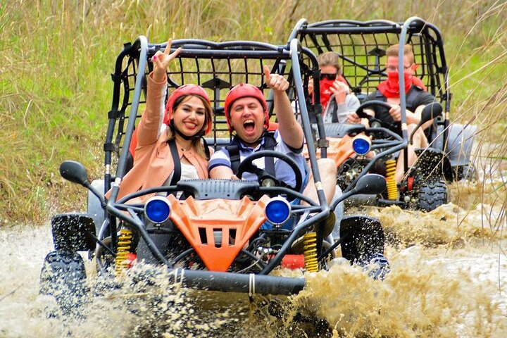 "Action-Packed Day: Quad or Buggy Safari and Rafting!"