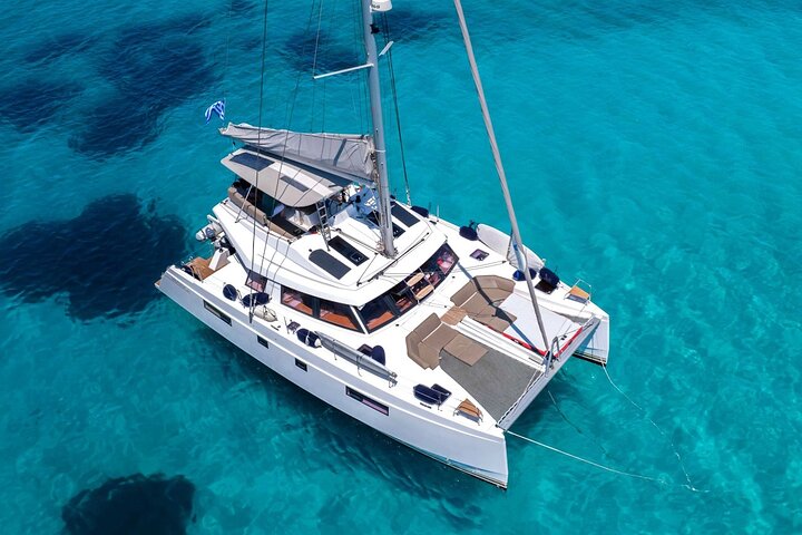 Chania: Private Day Catamaran Cruise with Swimming and Meal