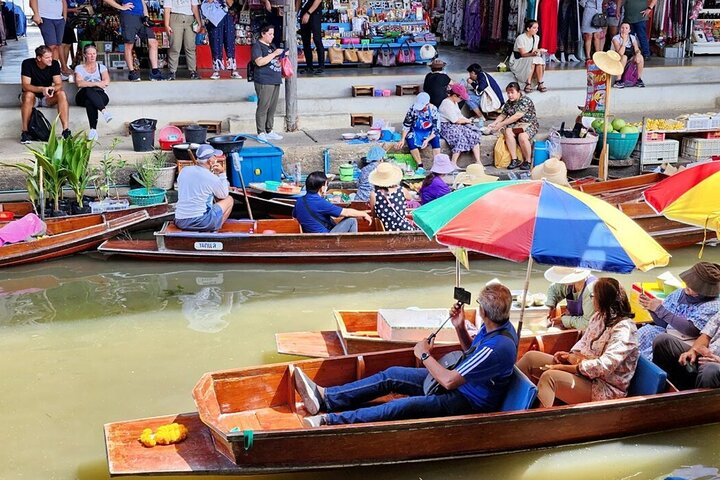 Maeklong Railway and Damnoen Saduak Floating Market Tour
