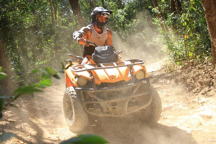 Atv tour from Cancun with ziplines and cenote swim experience
